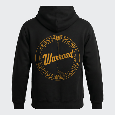 Back crest: full back view of the black hoodie showing the gold "Seeking Victory Since 2018" circular crest with a single hockey stick and star ring.