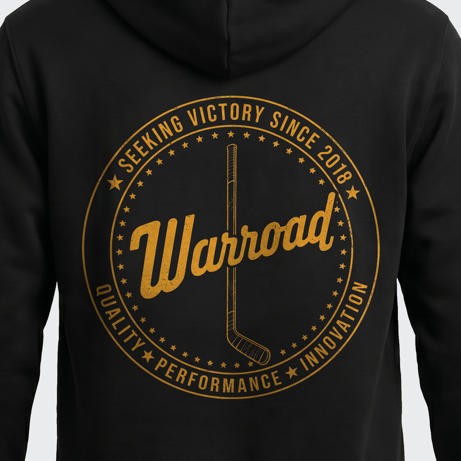 Back-crest close-up: macro of the gold "Seeking Victory Since 2018" back crest, hockey stick centered inside the star ring. - image 7