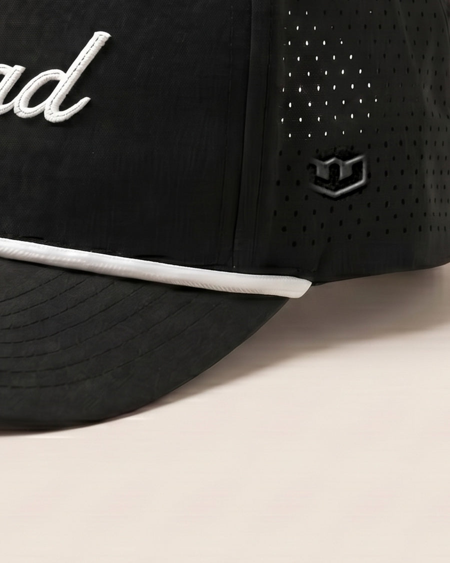 Detail: Close-up of the tonal Warroad W side shield embroidered on the cap panel. - image 5