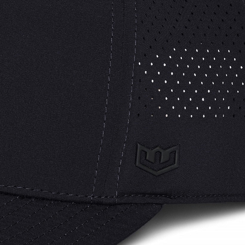Close up of the black W Series Hat side W shield and laser perforations - image 3